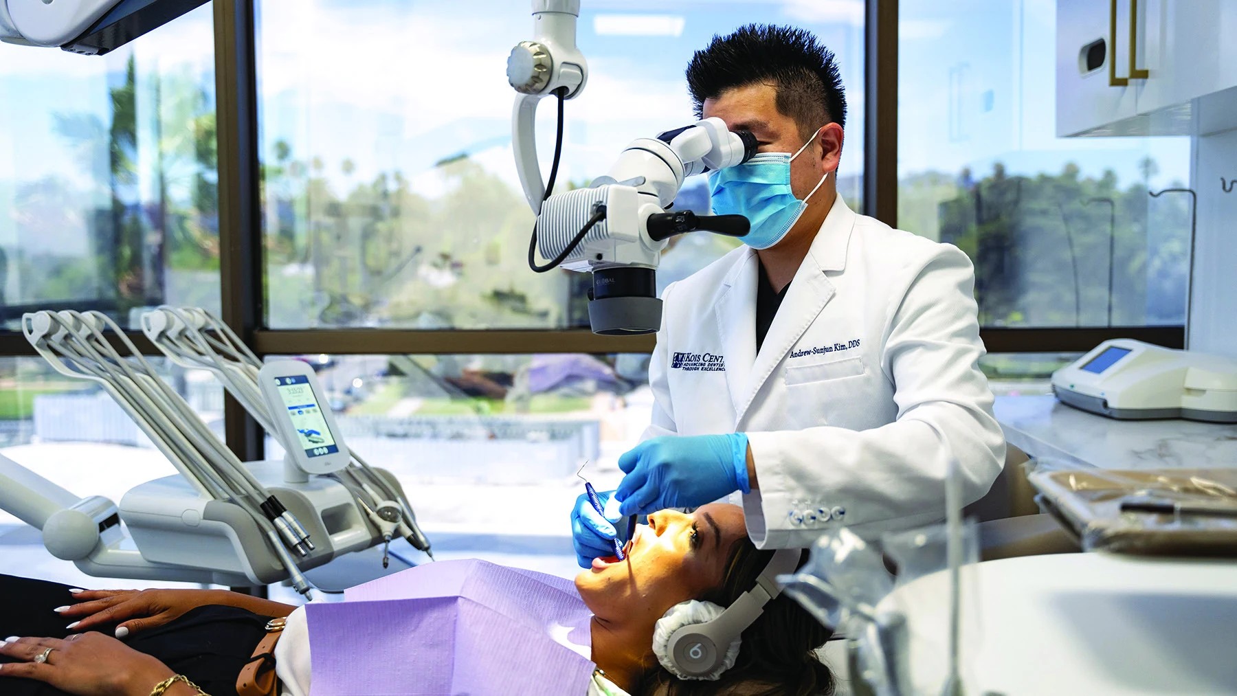 Dr. Kim providing microscope-enhanced dentistry